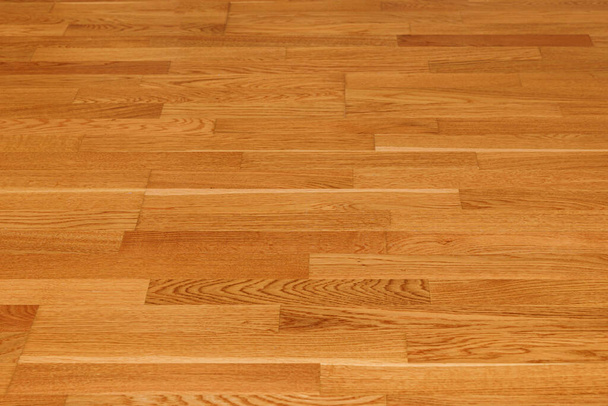 Fondo de textura de piso laminado marrón sin costuras. parquet superficie pulida de madera natural - Foto, imagen