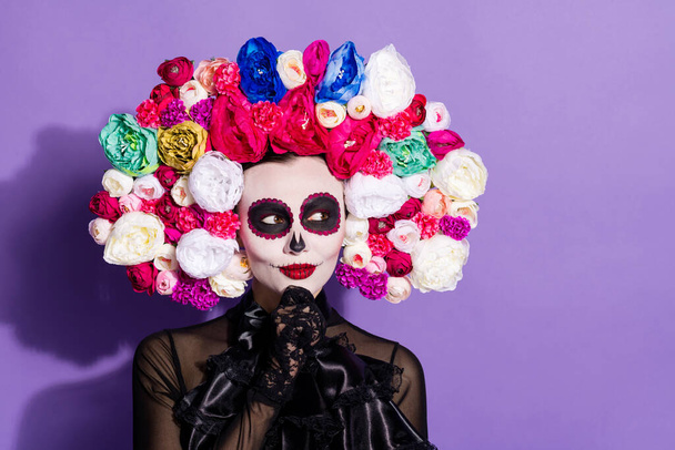 Photo of beautiful skull dead bride death day calaverita facial print boho zombie look interested sly empty space floral headband black costume dress isolated purple violet color background - Φωτογραφία, εικόνα