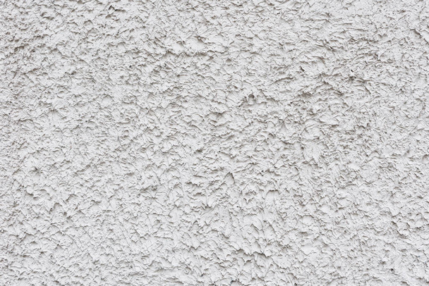 Fondo de textura de pared de estuco en relieve blanco áspero. espacio en blanco para diseñadores - Foto, imagen