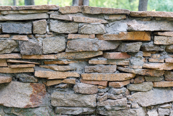 Fachada natural piedra decoración cuarcita fondo textura. pared de piedra de granito moderno - Foto, imagen