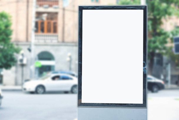Blank mock up of vertical street poster billboard on city background - Photo, Image