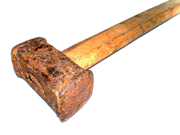 Iron sledgehammer with a wooden handle hand tools. Big hammer. Hand hammer. Construction tool. White background. Place for your text. Background image. Hard work. - Photo, Image