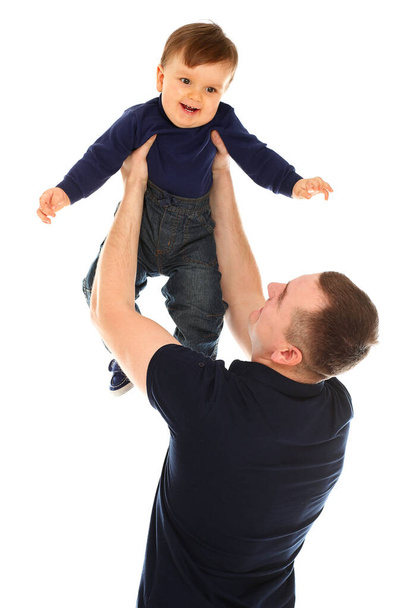 Father and son playing isolated over white background - Foto, Imagen