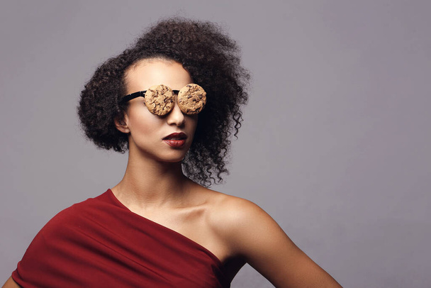 Weird, crazy. Woman with glasses made out of cookies - Photo, Image