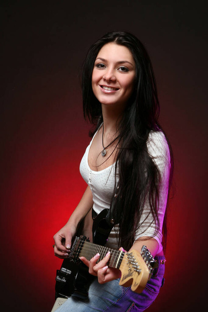 happy smiling teen playing guitar - Valokuva, kuva