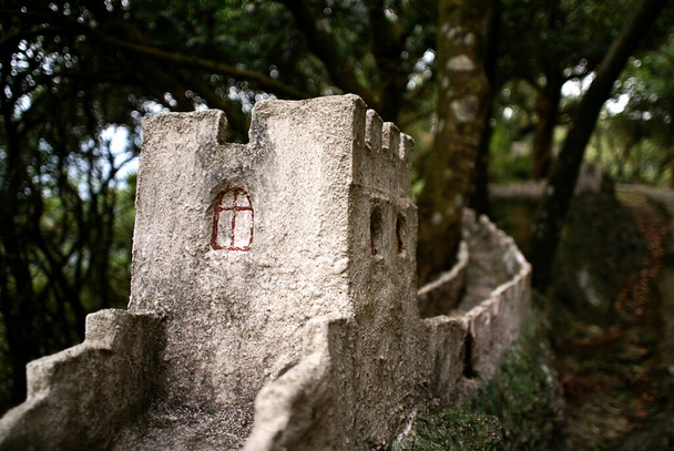 A model of great wall made by cement in a forest. - Photo, Image