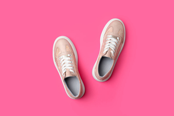 Stylish shoes on pink background, flat lay - Fotoğraf, Görsel