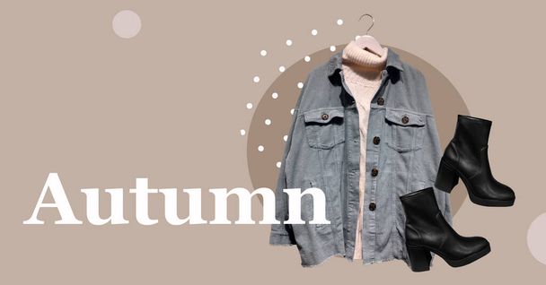 Corduroy denim jacket with a warm sweater on a hanger isolated and black boots. Women's look. Composition of clothes. Flat lay, top view, copy space. Winter, autumn clothes pattern. - Photo, Image