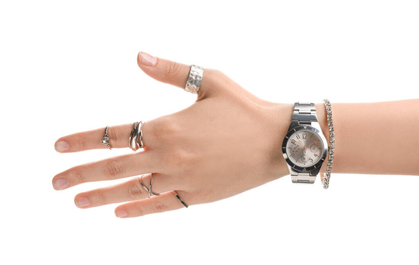 Kobieca ręka ze stylowym zegarkiem na białym tle - Zdjęcie, obraz