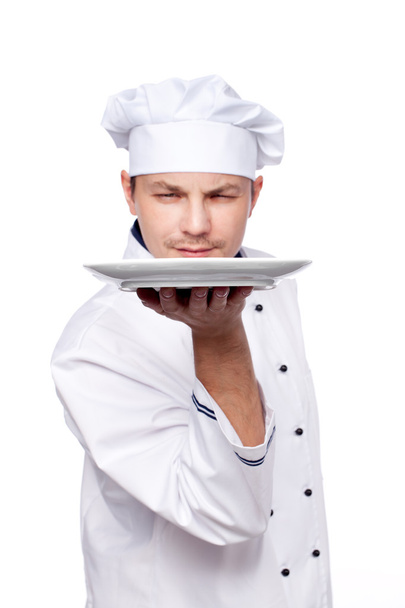 Chef holding empty plate - Foto, afbeelding
