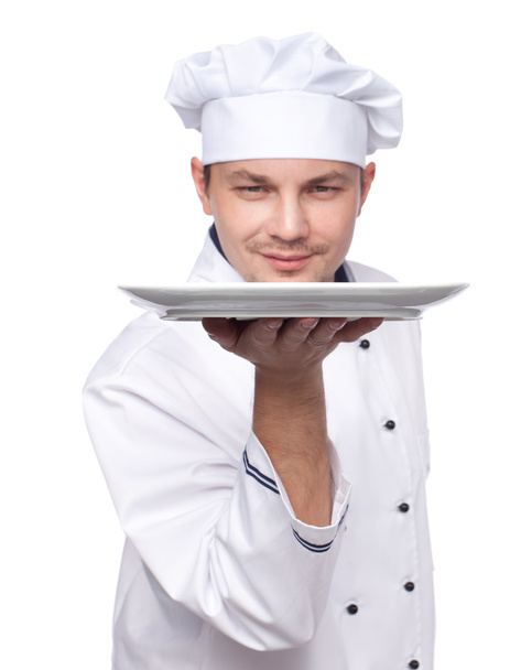 Chef holding empty plate - Фото, зображення