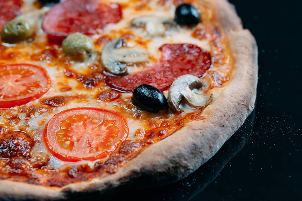 pizza Margarita close up with cheese and tomatoes. - Foto, Bild