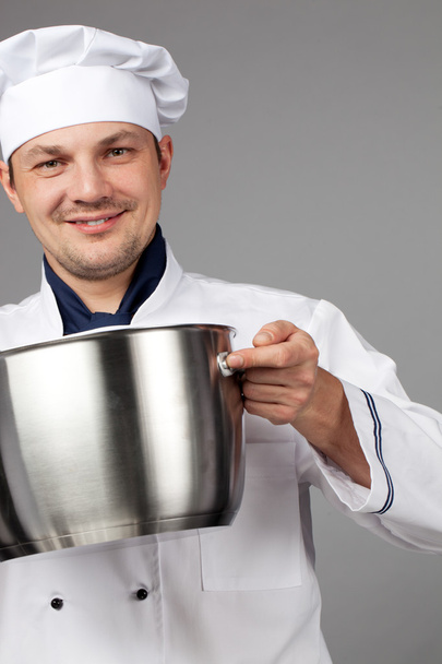 Chef cooking with pot - Foto, Bild