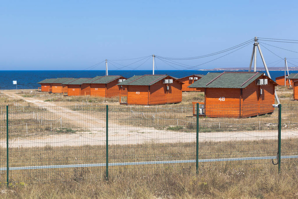 Olenevka, Chernomorsky district, Crimea - July 21, 2020: Camping Olenevka Village at Cape Tarkhankut, Crimea - Fotó, kép