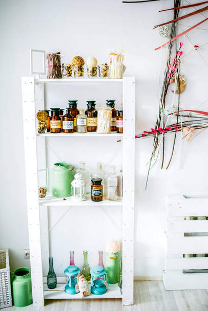 Wooden shelf with decorative elements - Фото, зображення
