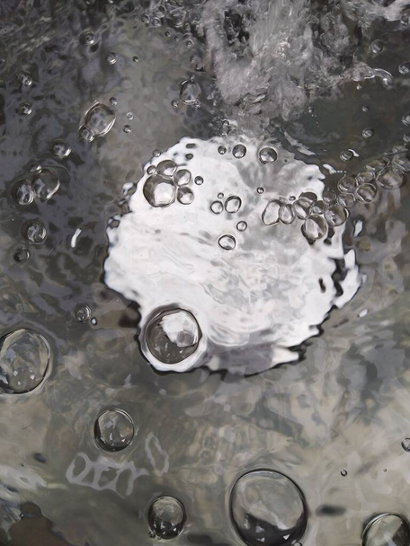 falling water and bubbles, Perfect for Background and Wallpaper - Photo, Image