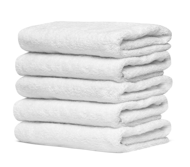 close up de uma pilha de toalhas brancas banheiro no fundo branco - Foto, Imagem