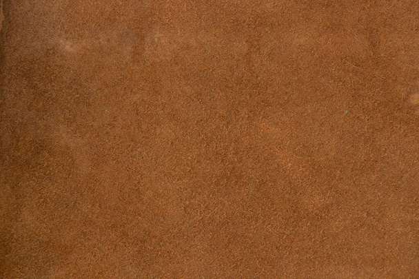暗褐色スエードレザーマクロ写真を背景に - 写真・画像