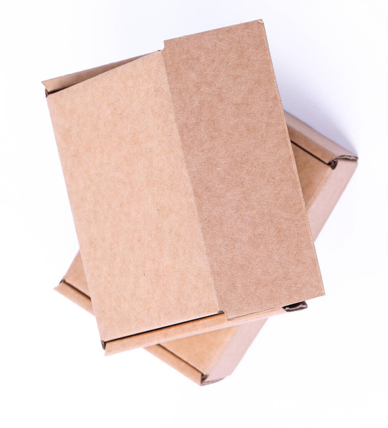 Carton boxes on a white background - 写真・画像