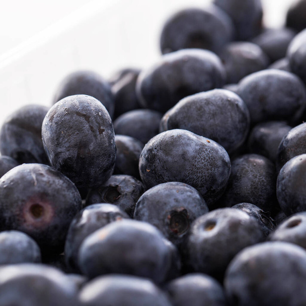 Picture of lots of blueberries over a white background - Photo, Image