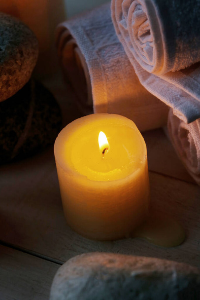 Aromatherapy. Candles and spa objects on the table - Photo, Image