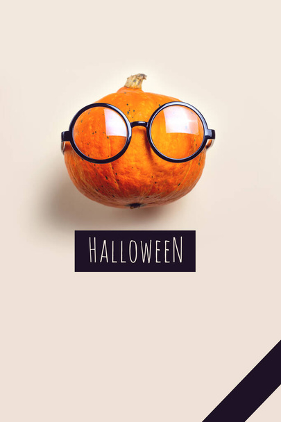 A portrait of Mr. Pumpkin with glasses. Halloween concept. - Photo, Image