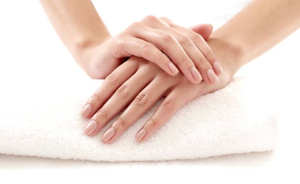 Skincare. Soft and clean hands on a white towel - Foto, afbeelding