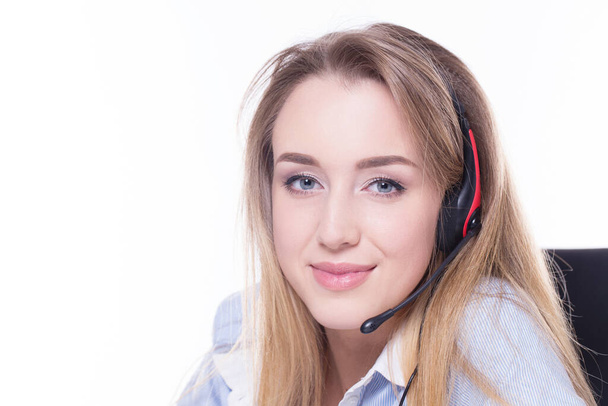 Business people. Woman with a headset on a white background - Photo, Image