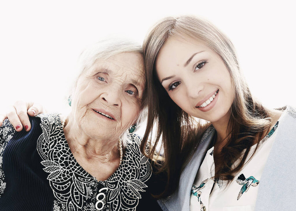 Пожилая женщина с внучкой - Фото, изображение