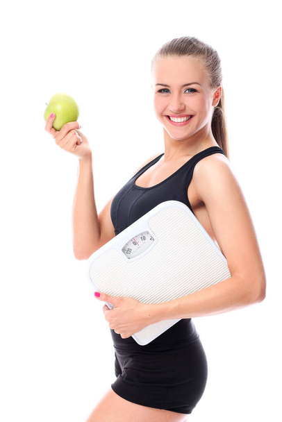 Attractive woman posing on white, sport and healthy life concept - Zdjęcie, obraz