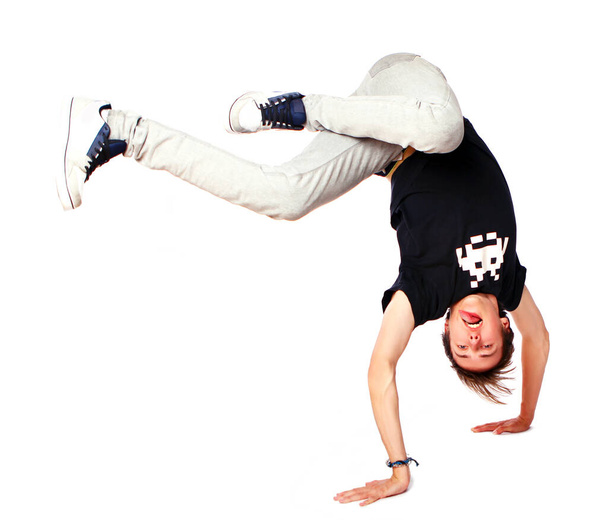 Young and attractive guy in hip hop dance pose - Fotografie, Obrázek