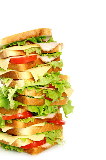 Πολύ μεγάλο σάντουιτς απομονώνονται σε λευκό φόντο - Φωτογραφία, εικόνα