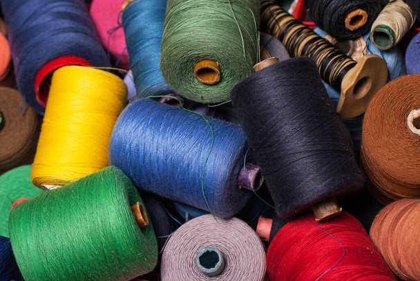 Closeup image of various colour thread rolls - Φωτογραφία, εικόνα