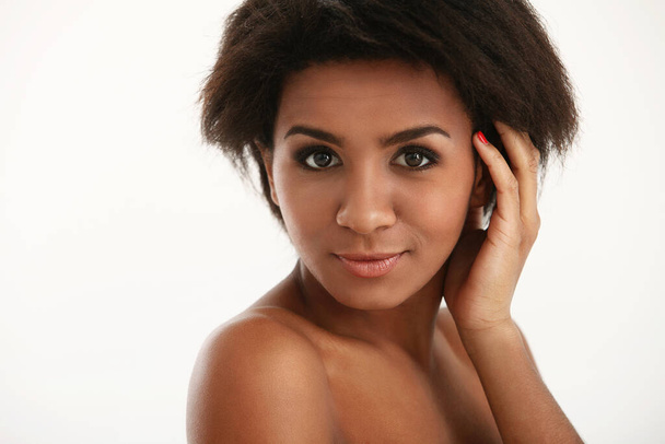 Young black brunette woman posing in studio - Photo, image