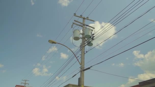 Electric utility pole with electric transformers - Footage, Video