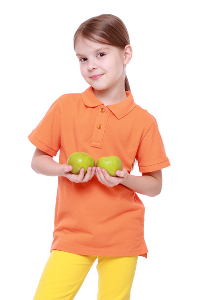 Girl with green apples - Foto, Bild