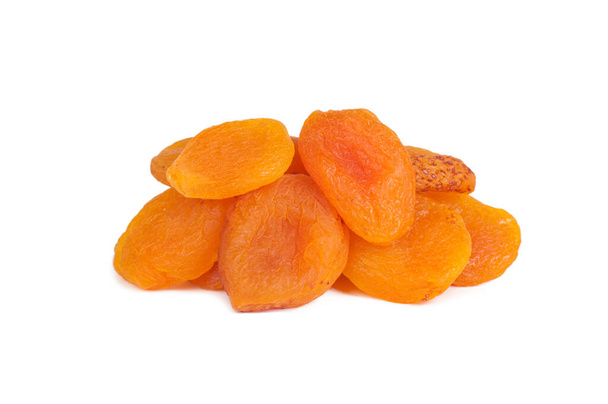 heap of dried apricots isolated on white background - Photo, Image