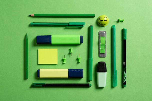 Stationery (for school or office) on a colored background. Flat. - Fotó, kép