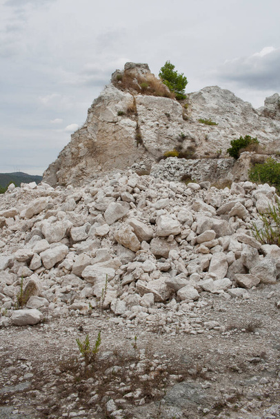 white gypsum mining quarry. Town of Odena, Anoia region, Barcelona, Catalonia, Spain. August 2020. - Photo, Image