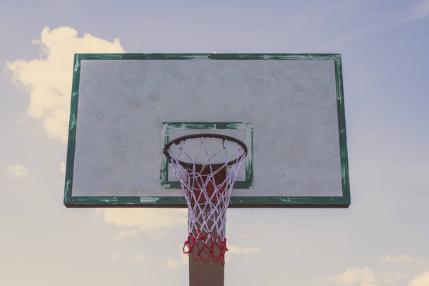 Basketball hoop on blue sky and cloud - Fotoğraf, Görsel