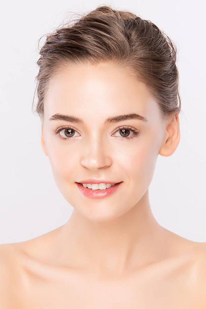 Beautiful Young Woman with Clean Fresh Skin, on white background, Face care, Facial treatment. Cosmetology, beauty and spa. women portrait - 写真・画像