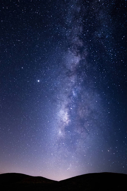 A vertical shot of beautiful starry sky - perfect for wallpaper - Photo, image