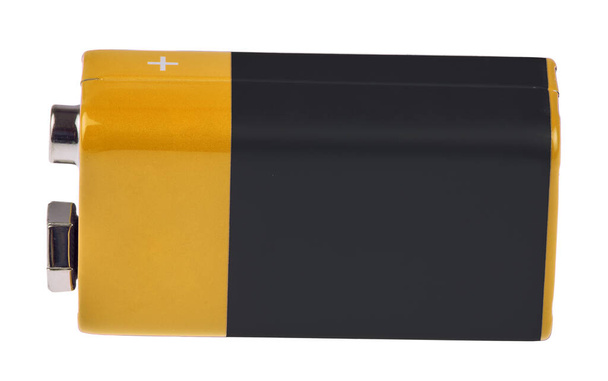 gold and black rectangular battery isolated on white background - Photo, Image