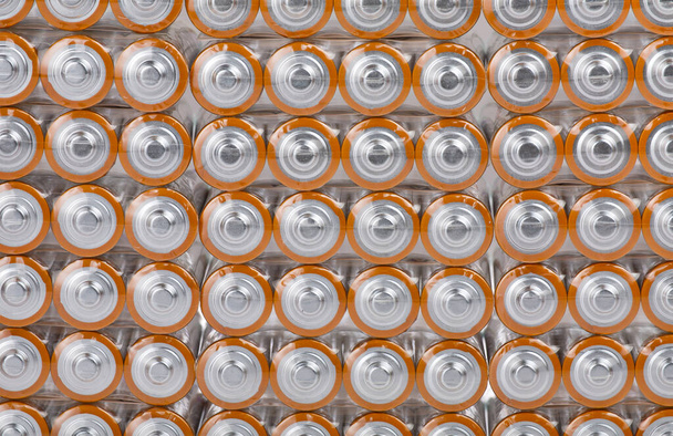 fundo de um grande grupo de baterias laranja - Foto, Imagem