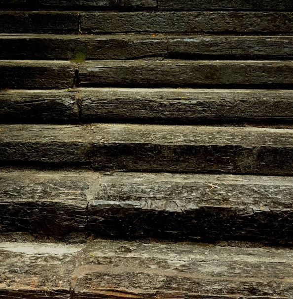 pattern from traditional handmade wooden stairs blackened with age and weathering - Photo, Image