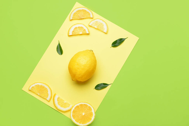 Composition with ripe lemons on color background - Photo, Image