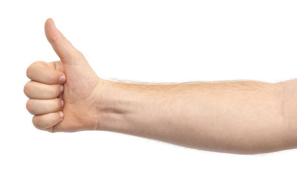Männliche Hand zeigt Daumen nach oben Geste isoliert auf weißem Hintergrund - Foto, Bild