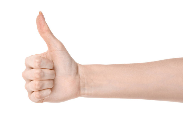 Weibliche kaukasische Hände isoliert weißen Hintergrund zeigt Geste Daumen nach oben, Zustimmung. Frauenhände zeigen unterschiedliche Gesten - Foto, Bild