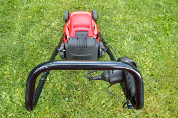 new lawnmower on green grass - Photo, Image