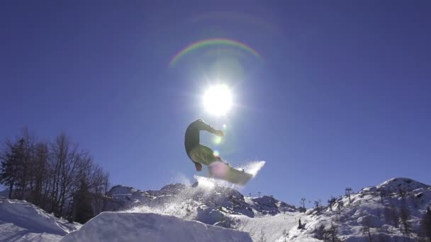 Snowboardista jumping - Záběry, video